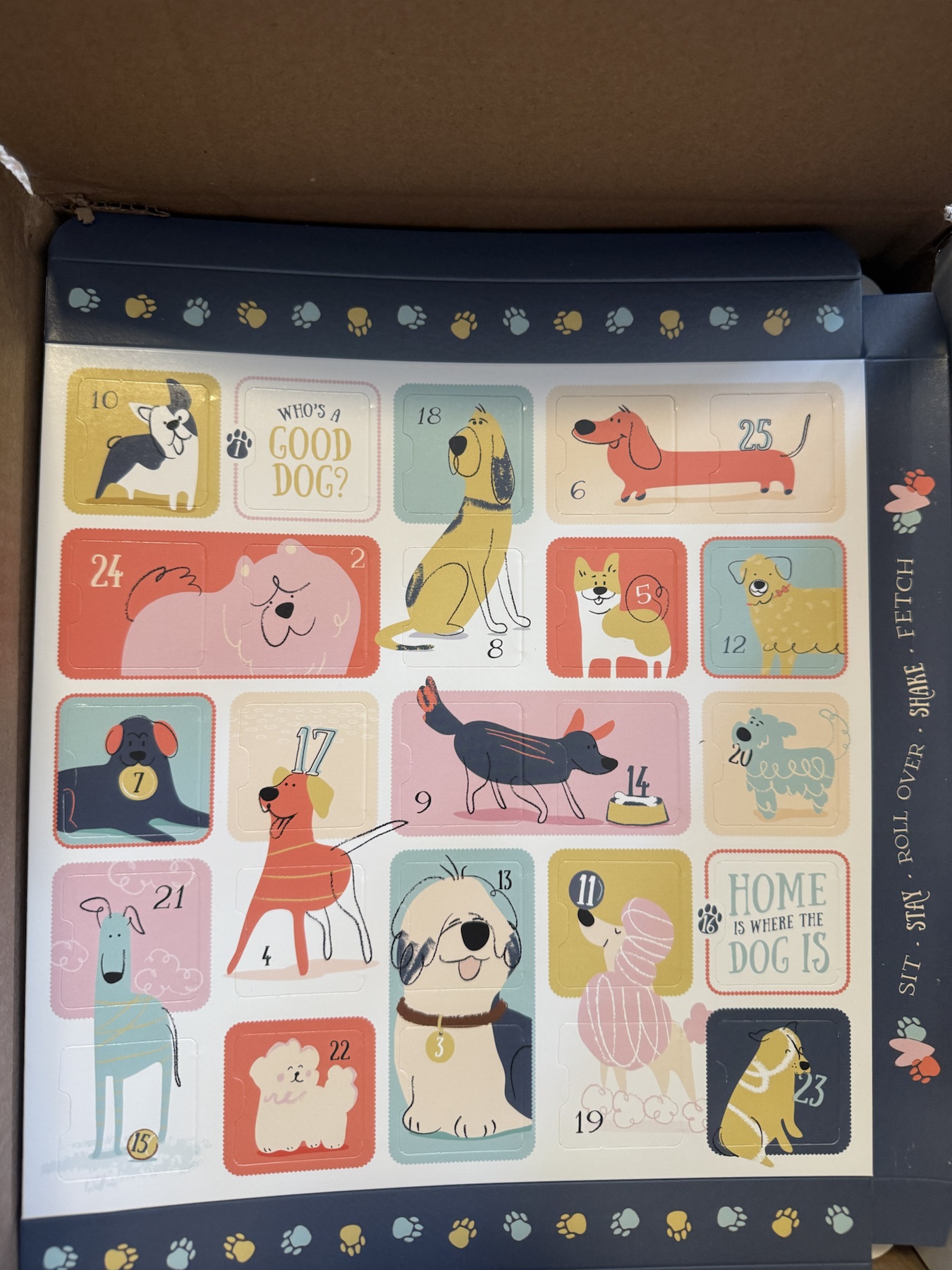 Dog-themed sample Advent calendar with colorful illustrated numbered doors